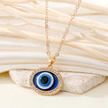 Gold Tone Oval Crystal Halo Blue Evil Eye Pendant Necklace view 4