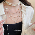 Layered Pearl Strand Tassel Necklace with Distinctive Textured Details view 3