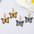 Gold Tone Black Enamel Butterfly Huggie Drop Earrings in Two Colors view 1