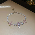 Pink Crystal Butterfly And Flower Bracelet In Gold Or Silver Tone view 7