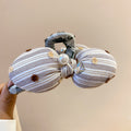 White Fabric Bow Claw And Large Loop Hair Claws In Black Or Purple view 6