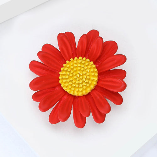 Angled product view showing the brooch surface details