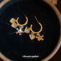 Moon Star and Heart Charm Gold Tone Hoop Drop Earrings view 2