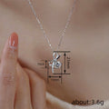 Silver Tone Bow Pendant Necklace Clear Center Stone view 4