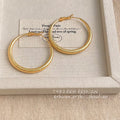 Gold Tone Textured Round Hoop Earrings In Two Graduated Sizes view 7