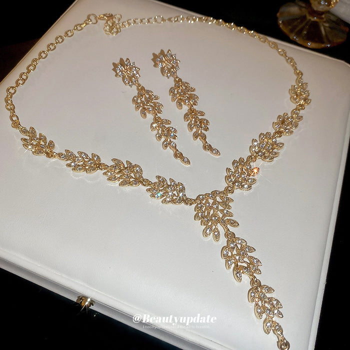 Gold Tone Wheat Leaf Crystal Necklace And Long Earring Set