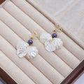 Four White Petal Flower Bead Hook and Clip Earrings view 9