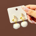 Rabbit Hook Pom Pom and Stud Earrings in Three Styles view 3