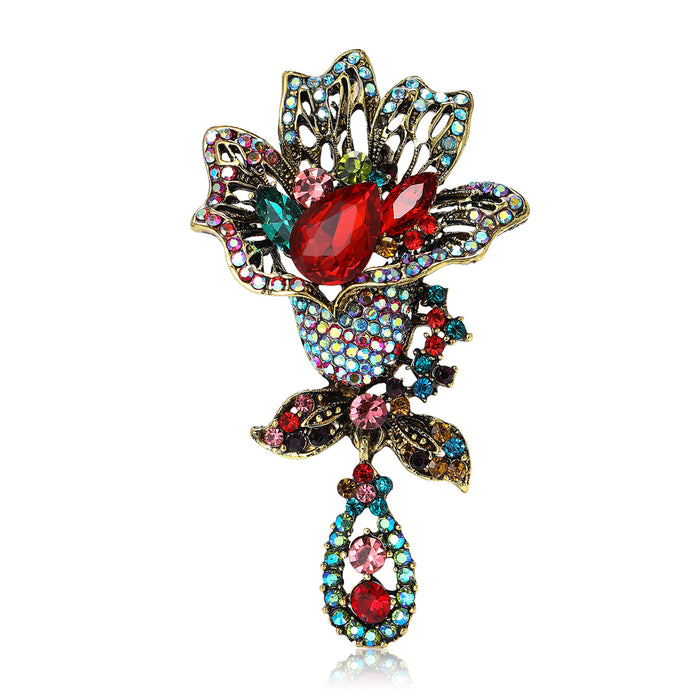 Antique Tone Floral Bird Brooch With Long Crystal Drop