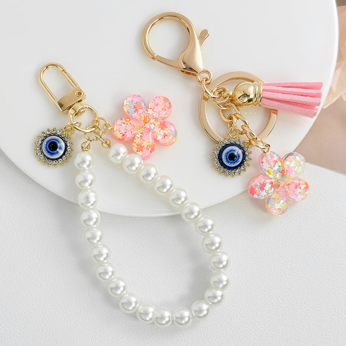 Pearl Beaded Wristlet Keychain with Evil Eye and Glitter Flower Charm