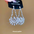 Silver Openwork Crystal Teardrop Stud Earrings with Polished Metal Details view 2