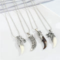 Silver Tone Faux Tusk Pendant Necklaces in Three Gothic Designs view 1