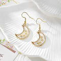 Gold Tone Crescent Moon Pressed Flower Drop Earrings in Eight Designs view 8