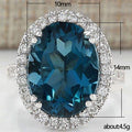 Teal Oval Halo Statement Ring In Polished Silver Tone view 5
