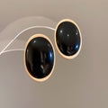 Gold Tone Oval Resin Stud Earrings in Black and Burgundy view 6