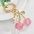 Resin Cherry Pair Charm Keychain with Gold Tone Hardware Accents view 4