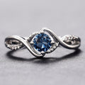 Blue Round Solitaire Wave Ring In Polished Silver Tone view 2