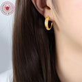 Gold Steel Textured Crescent Hoop Stud Earrings Dimple Finish view 3