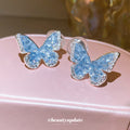 Blue Crystal Butterfly Stud Earrings With Silver Tone Edges view 2