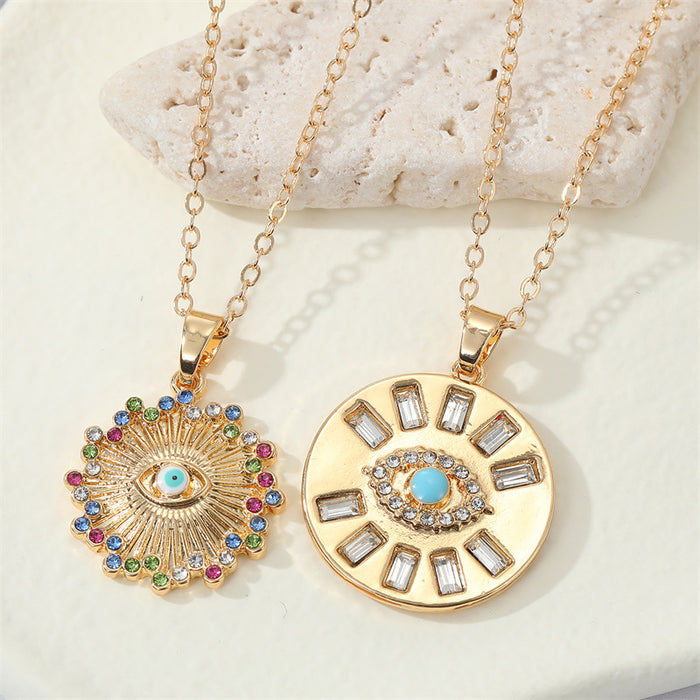 Gold Tone Round Crystal Evil Eye Pendant Necklaces in Two Designs