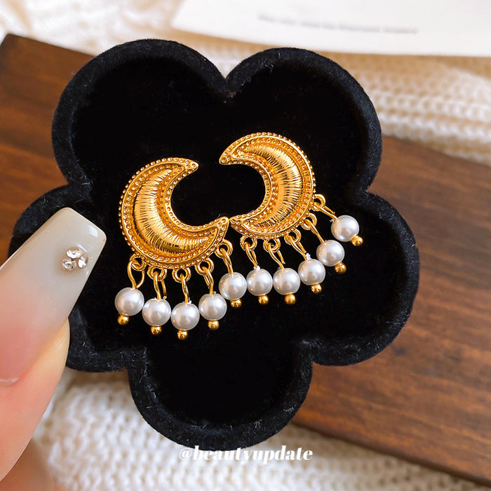 Crescent Pearl Fringe Earrings in Polished Statement Design