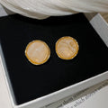 Cream Resin Stud Earrings in Round and Square Shapes view 8