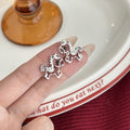 Four Red Gold and Silver Rocking Horse Stud and Dangle Earrings view 9