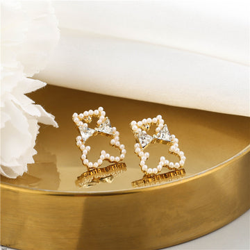 Clear Look Bow Outline Gold Tone Statement Stud Earrings