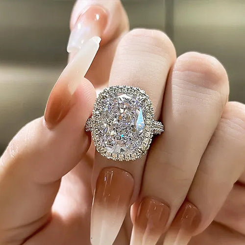 Second product view showing oversized silver-tone rectangular solitaire double-halo ring