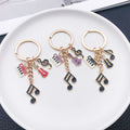 Six Color Piano Violin Headphone and Music Note Keychains view 3