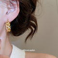 Gold Tone Textured Twisted Openwork Huggie Hoop Earrings view 4