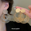 Gold and Silver Tone Wire Wrapped Circle Drop Earrings view 1