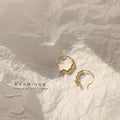 Gold Abstract Face Profile Open Hoop Earrings Minimal Outline Pair view 6