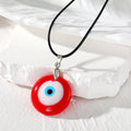 Round Resin Evil Eye Pendant Necklaces on Black Cords view 2