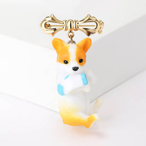 Orange And White Dog Brooch With Bow With Polished Metal Detail