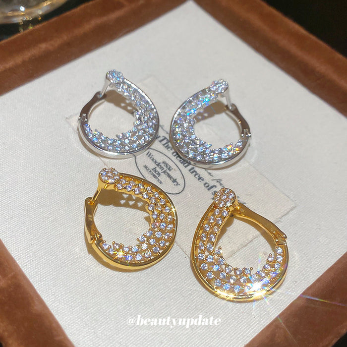 Crystal Open Teardrop Hoop Earrings In Silver And Gold Tones