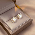 Gold Tone Pearl Stud Earrings with Clear Crystal Halos view 3