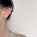 White Pearl Stud Earrings Silver Crescent Pavé CZ Base view 2
