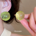 Translucent Round Resin Stud Earrings in Cream and Green view 3