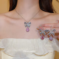 Silver Crystal Butterfly Bow Teardrop Earrings and Necklaces view 2