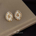 Gold Cream Enamel Cameo Stud Earrings Pearl Profile view 1