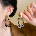 Leopard Print Geometric Resin Drop Earrings With Metal Details view 1