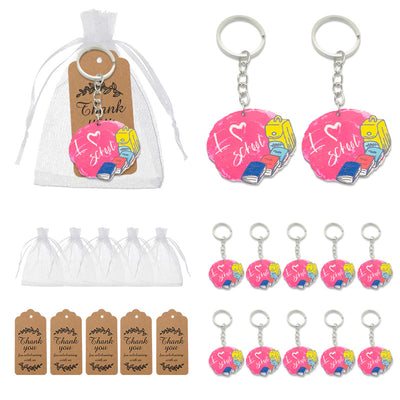 Package comparison showing school keychains alone and with white organza bags and thank-you tags.