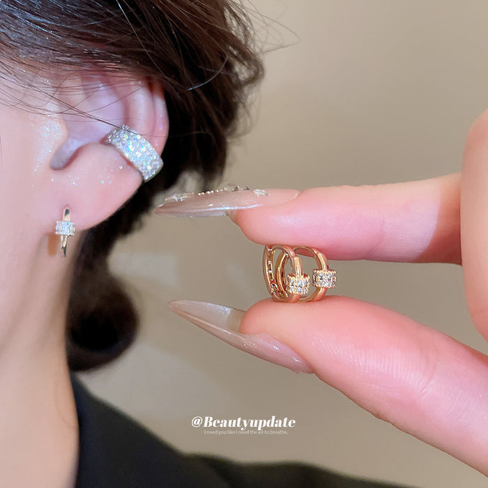 Crystal Pave Huggie Earrings in Three Metal Finishes