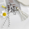 Smiley Daisy Flower Bag Charm Keychain With Braided Cord And Tassel view 3