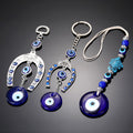 Silver Tone Horseshoe and Fish Blue Evil Eye Keychains in Three Designs view 1