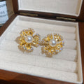 Pearl Center Radiating Flower Clip On Earrings With Polished Metal Details view 7
