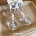 Clear Resin Flower Drop Earrings with Pink Beads and Sculpted Petals view 2