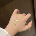 Gold Tone Wheat Tassel Necklace In Two Styles With Decorative Metal Details view 3
