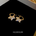 Gold Tone Crystal Star Hoop Earrings with Open Centers view 3